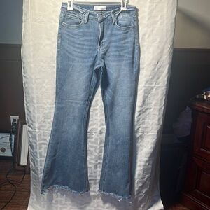 Women’s flare leg size 28 jeans with frayed bottoms. Vervet!